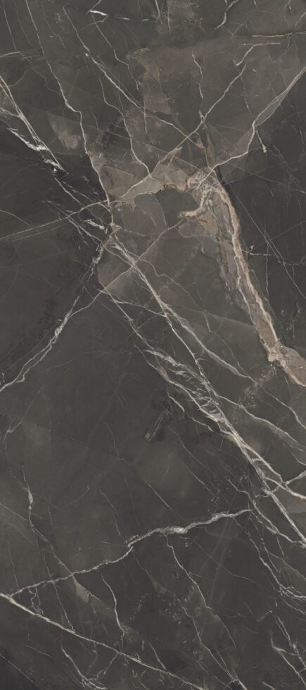 Thunder Rumble porcelain slab – a marble-looking large-format tile with deep brown tones and white veining.