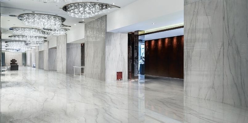 a marble floor with a chandelier